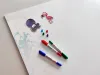 Dry-erase magnetic board for kids, watercolor design 580 - features colorful drawings on a white background.