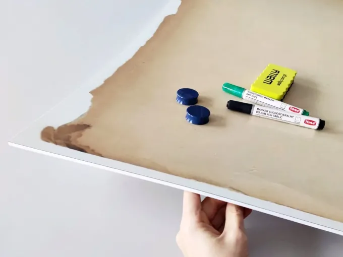 Magnetic whiteboard paper 166 - Graphic design features brown, slightly aged paper.