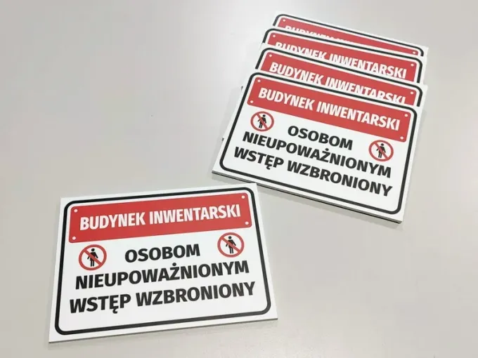 Inventory building sign: Authorized personnel only - Graphic design. Rectangular sign with red accents.