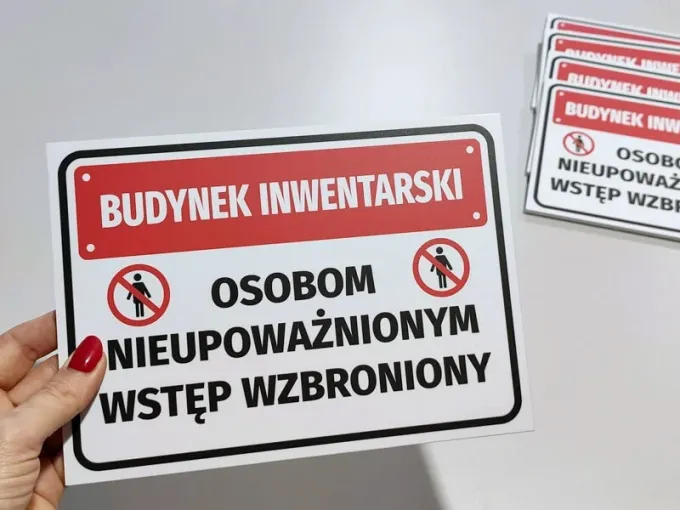 Inventory building sign - Unauthorized entry prohibited. Rectangular sign with red design.