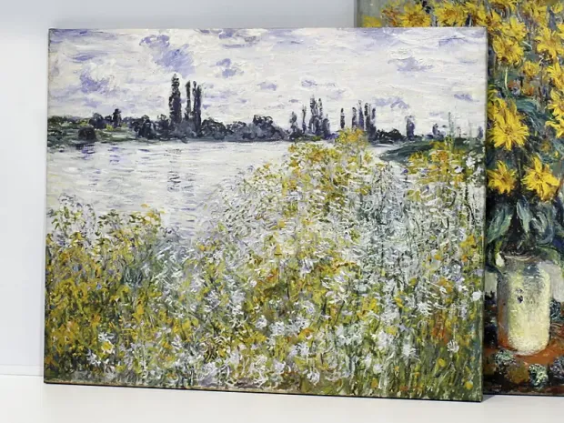 Reproduction of Ile aux Fleurs near Vetheuil by Claude Monet. The artwork features flowers in the foreground.