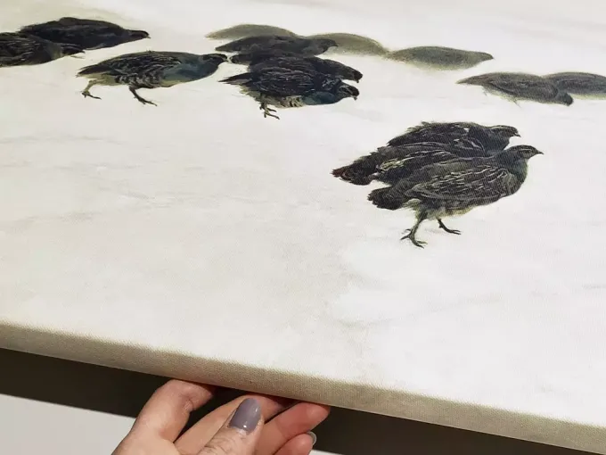 Reproduction of the painting Partridges in Snow by Józef Chełmoński. Partridges in various poses on a light background.