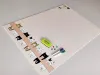 Magnetic dry-erase board for kids featuring cat designs on a white background.