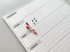 Weekly dry-erase magnetic board lean planner 017 - Simple grid with days of the week and colorful accents.