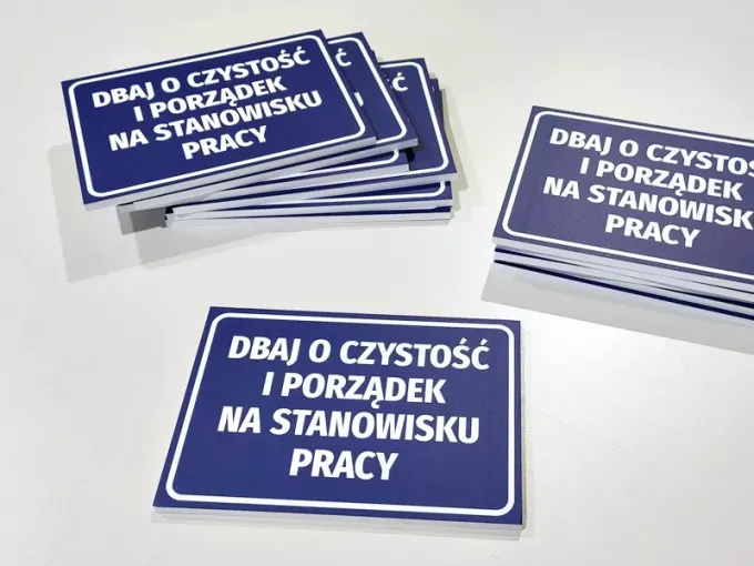 Cleanliness and order at the workplace sign - Rectangular sign with white text.