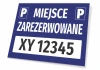 Reserved parking sign with space for vehicle registration number - Rectangular design in blue.