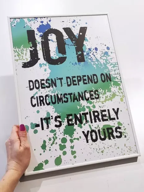 Set of 3 A3 individual posters in a white aluminum frame - graphic design with colorful splashes and text on a white background.