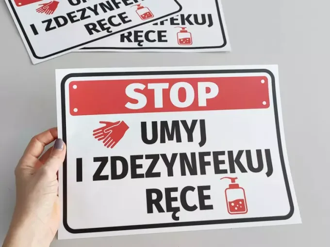 Wash and disinfect hands sticker - Graphic design. Red rectangle with text, hands, and bottle icon.