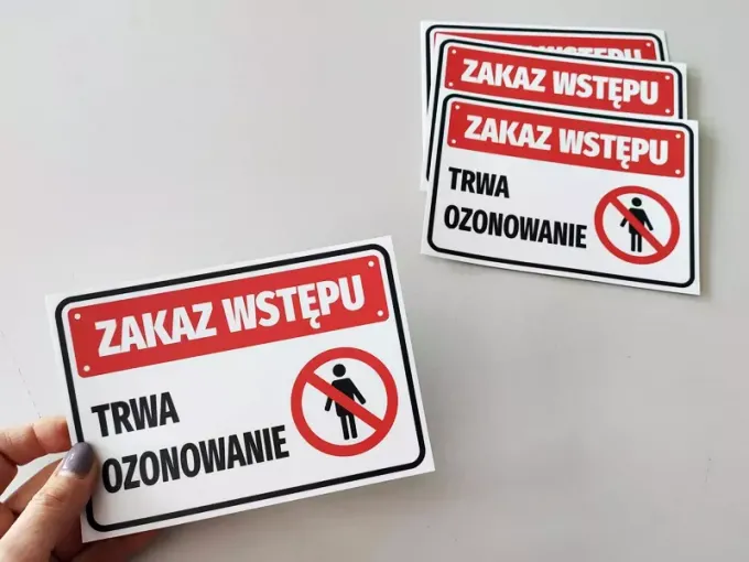 No Entry Sticker - Ozone Treatment in Progress. Red rectangle with white text and crossed-out figure symbol.