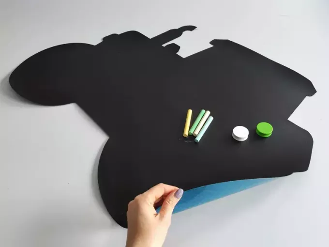 Chalkboard magnetic board for kids, tractor design with additional drawing accessories.