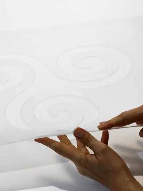 Reusable individual painting template - Graphic design featuring two spiral shapes.