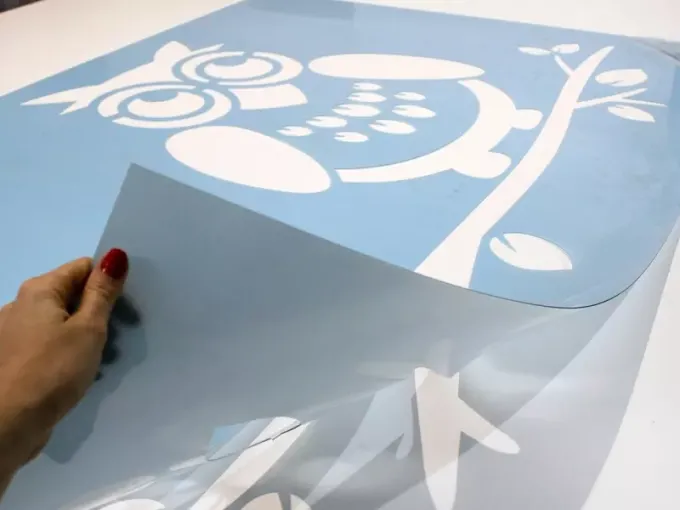Reusable owl painting stencil on a branch - Graphic design with round eyes and rounded features.