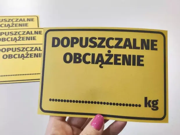 Load limit sticker - Graphic design. Yellow background with black text and space for weight in kilograms.