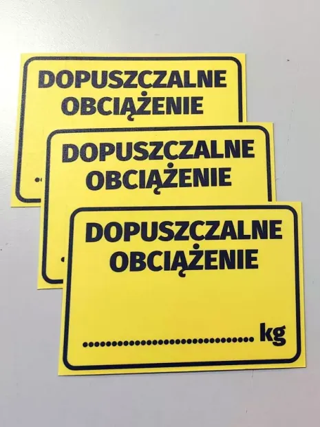 Load Limit Sticker - Graphic Design. Yellow background with black text and rectangular edges.