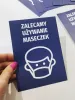 Sticker: We recommend wearing masks - Graphic design. White figure with a mask on a blue background.