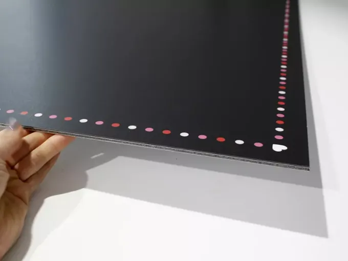 Chalkboard with a 3mm dibond backing - Graphic design. Black background with colorful dots along the edges.