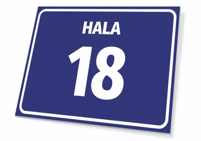 Blue rectangular sign with number and letter designation, featuring a graphic design and white text.