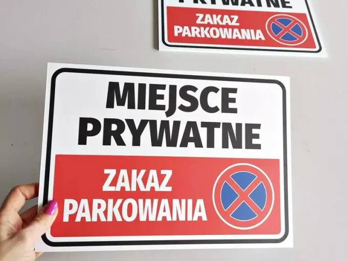 Private Area Sign - No Parking - Graphic Design. Red background with white text and prohibition symbol.