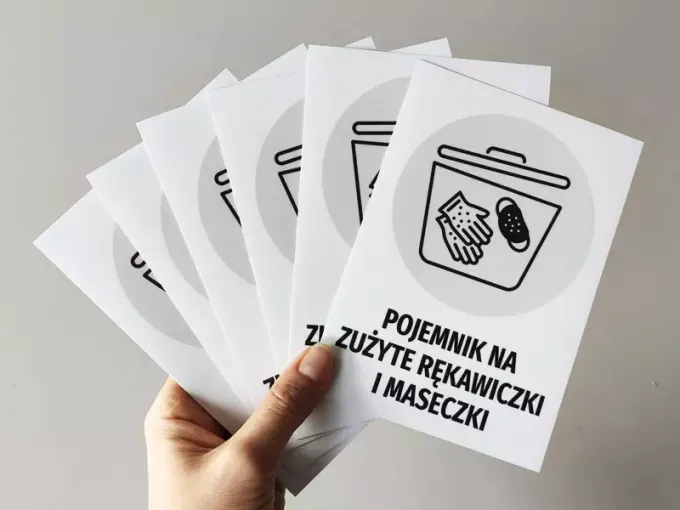 Sticker for used gloves and masks container - Graphic design featuring a container with hands and a mask illustration.
