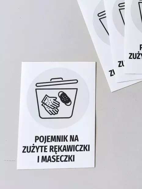 Sticker for used gloves and masks container - Graphic design featuring a container with gloves and a mask.