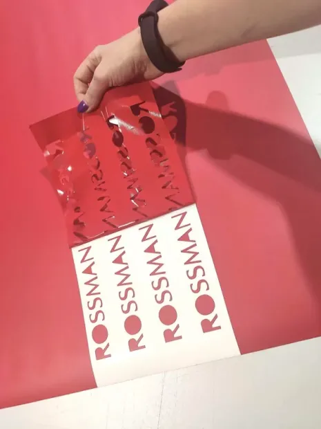red vinyl plotter stickers with transfer, size 14.5x2 cm - Graphic design. The graphic includes