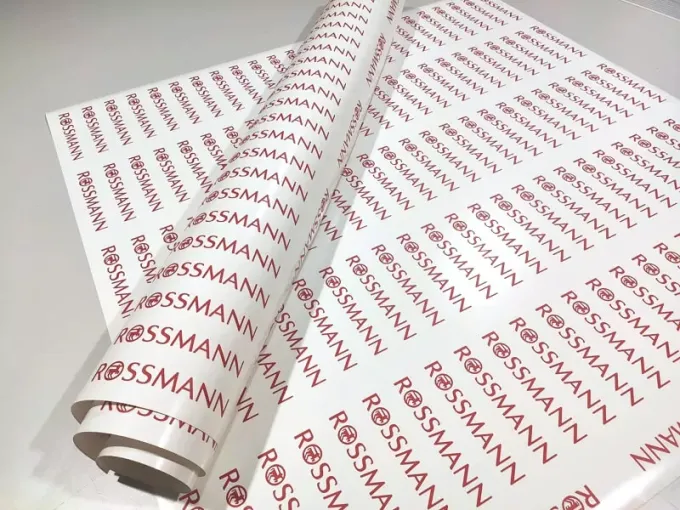 Red vinyl plotter-cut stickers with transfer, size 14.5x2 cm - Repeating graphic design.