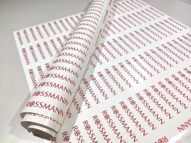 Red vinyl plotter-cut stickers with transfer, size 14.5x2 cm - Repeating graphic design.