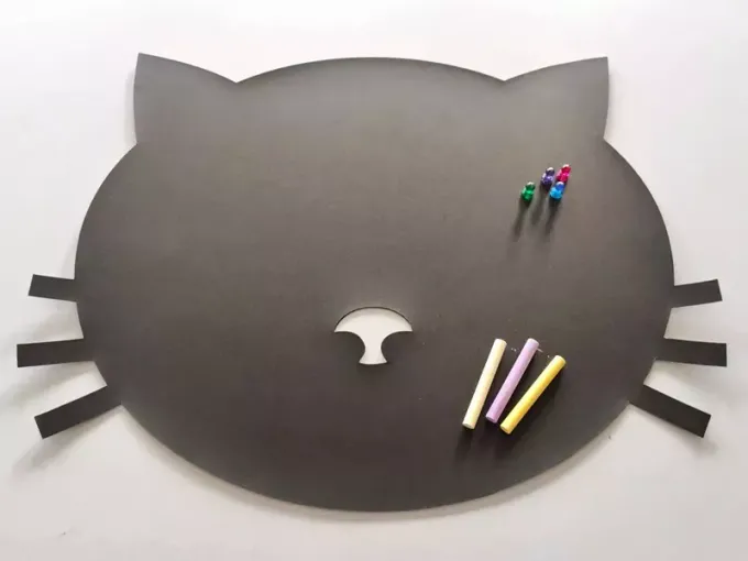 Chalkboard magnetic board for kids in cat shape with ears, eyes, and whiskers, includes chalk.