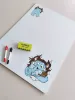 Dry-erase magnetic board for kids featuring a blue monster design.