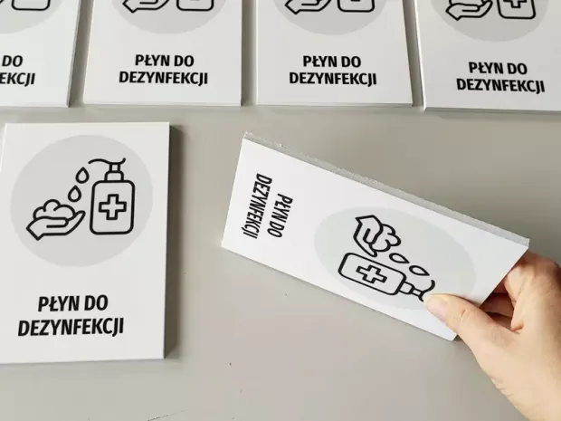 Disinfectant Liquid T480 - Graphic design featuring a bottle, hands, and a cross symbol.