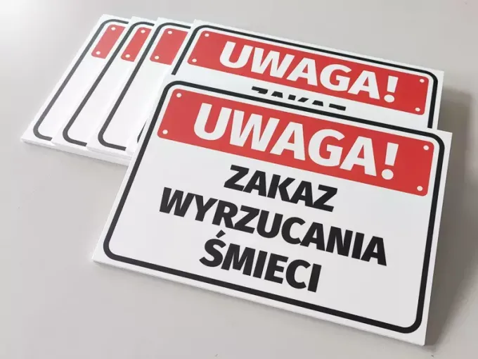 No Littering Sign - Graphic Design. Simple rectangle with a red background and bold black text.