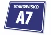 Blue rectangular nameplate with number and letter, featuring a graphic design and white text.