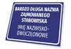 Nameplate with position title and name - Graphic design. Rectangular plaque with blue background and white text.