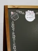Chalkboard A-frame with custom print - Graphic design featuring pastry elements and decorative patterns.