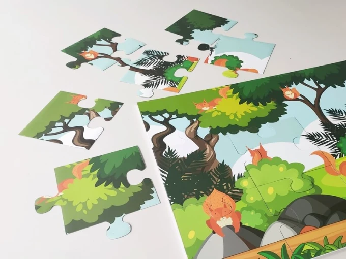 Magnetic film puzzle with a printed design, 80 x 60 cm - features trees and foxes.