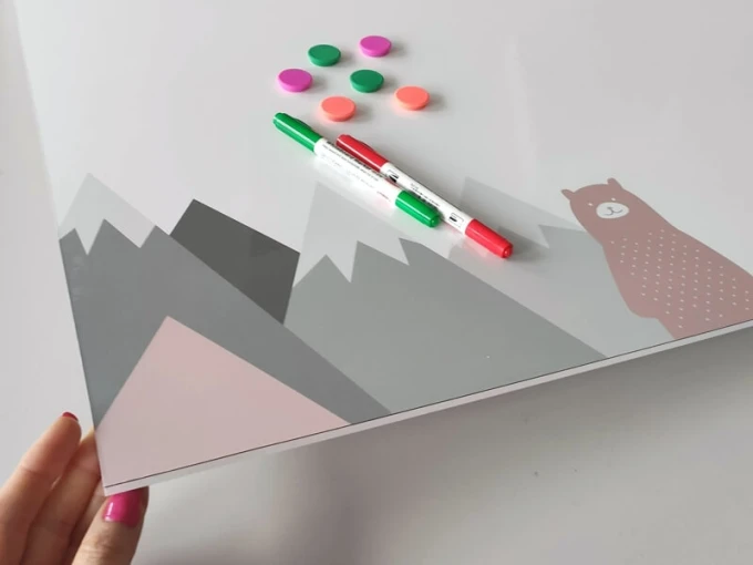 Magnetic dry-erase board featuring a bear, mountains, and balloons in gray shades.