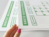 Lean safety cross dry-erase board 080 - Graphic design. Green text on a white background, table elements included.