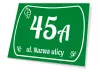 House number sign with street name - Graphic design. Green background with white numbers and text, adorned with leaves.