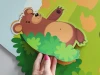 Custom-shaped magnets based on design, matte finish - Features a bear among nature.