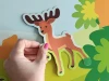 Custom-shaped magnets based on design, matte finish - Features a deer with large antlers.