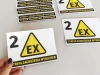 Explosion hazard sticker N267 - Graphic design. Yellow triangle with black EX text on a black background.