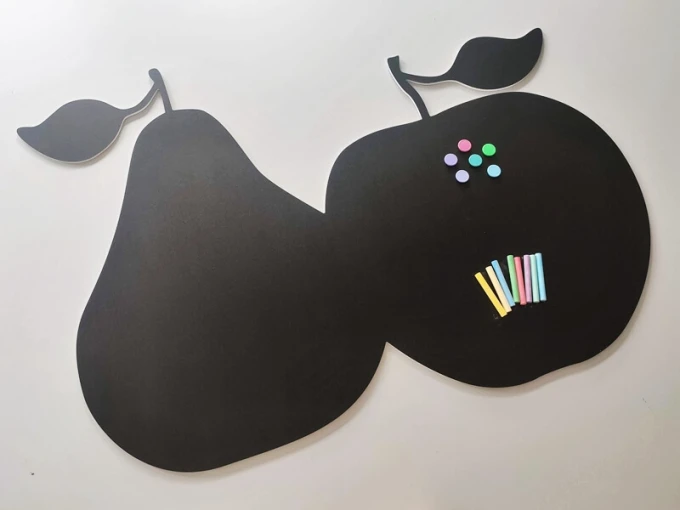 Chalkboard magnetic board with pear and apple shapes, featuring colorful crayons and magnets.