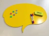 Magnetic dry-erase board for kids in cloud shape, yellow with colorful designs.
