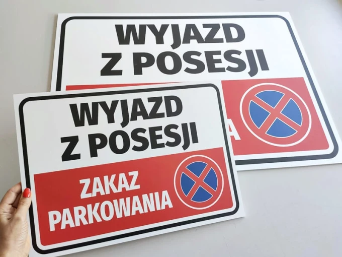Exit from property sign, no parking - Graphic design. Rectangular sign with large letters and prohibition pictogram.