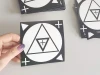 Individual sticker set - Graphic design. Triangle in a circle with crosses in the corners.