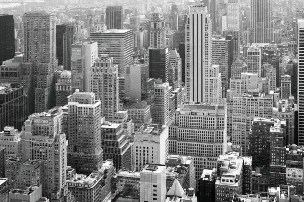 Manhattan FP 6447 wall mural - Graphic design featuring a densely built cityscape with tall buildings in shades.