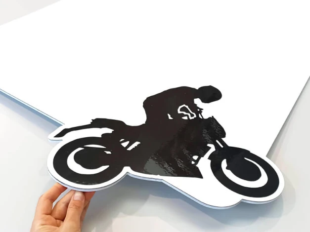 Magnetic dry-erase board with motocross design, reinforced PVC backing, 5mm thick, available in various sizes.