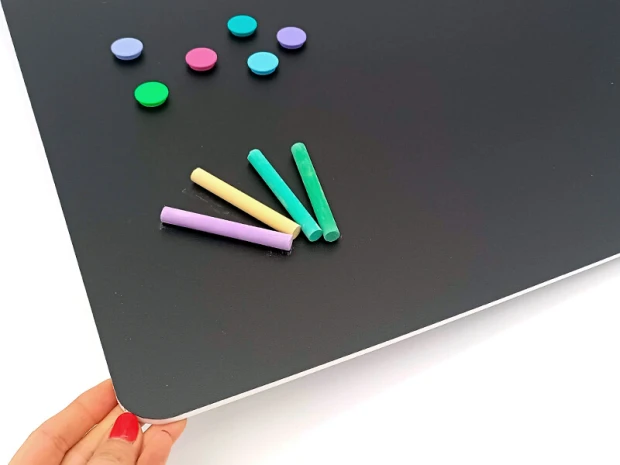 Chalkboard magnetic board with rounded corners 017 - Graphic design. Black background with colorful magnets and chalks.