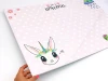 Dry-erase magnetic board for kids featuring a unicorn design with white stars on a pink background.