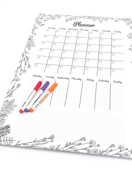 Dry-erase board Planner 477 - Floral edge design with a weekly grid layout.